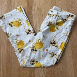 High waisted boot cut white and yellow lemon paint-printed jeans